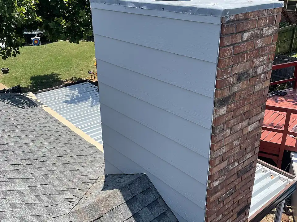 Chimney chase with new siding