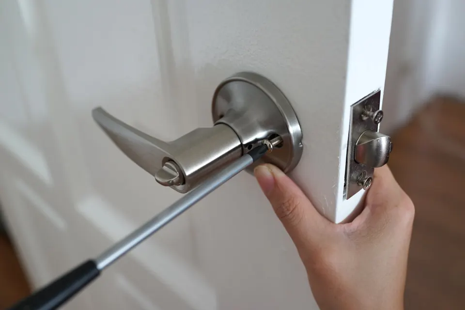 Hand fitting a door lever